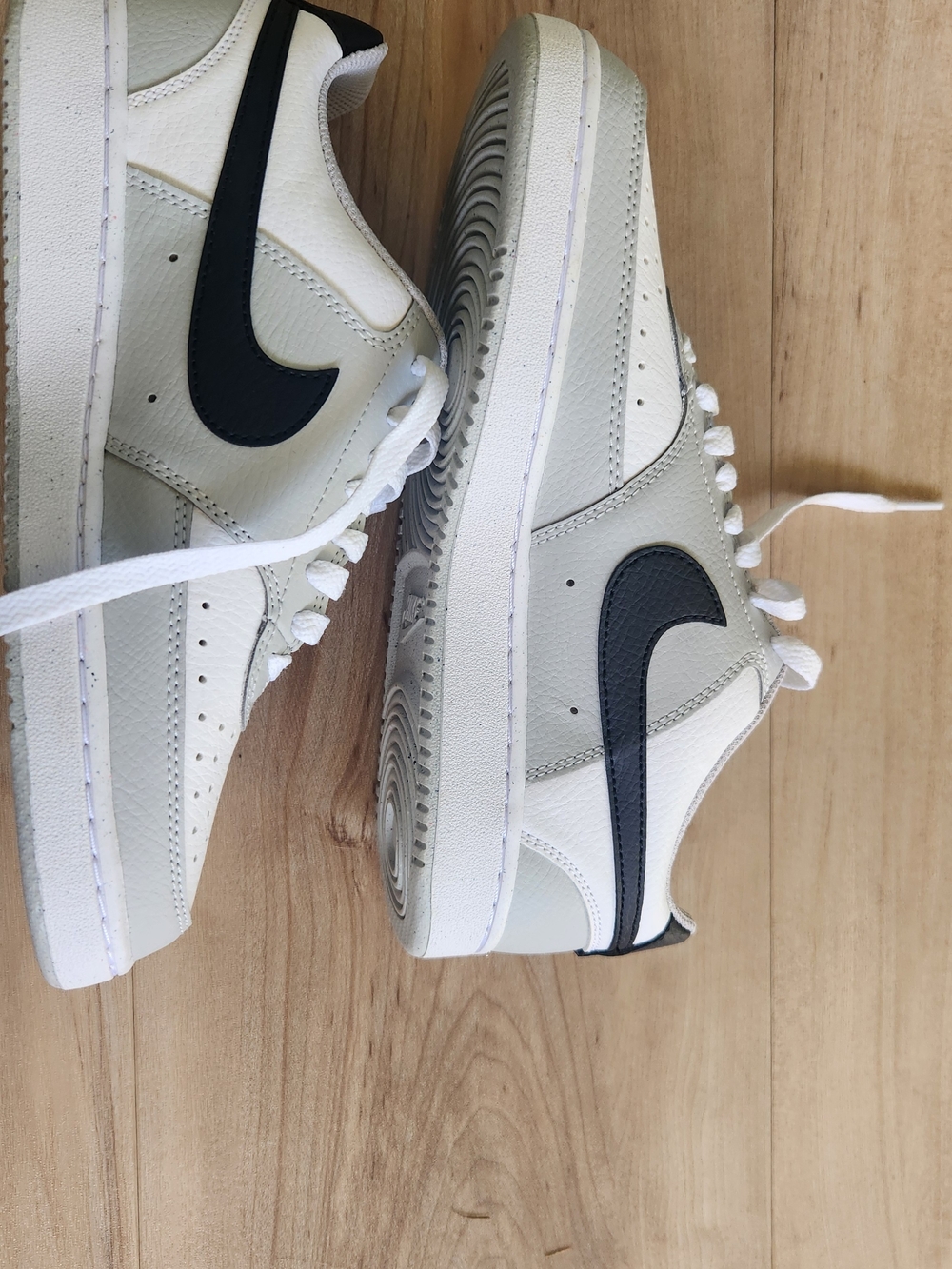 Nike Men’s Low-Top Leather Sneakers in White and Black